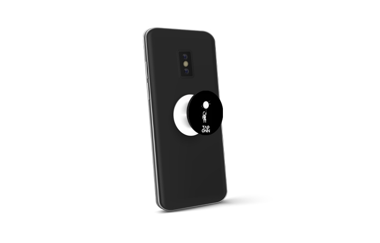 smart pop socket attached behind phone